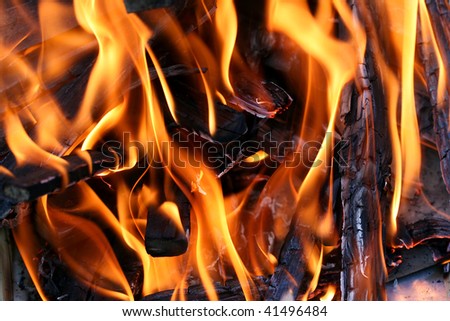 this is a close up shot of fire under my grill like nice background