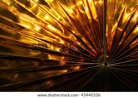 This is a closeup shot of some golden decoration, for New Year, like nice background.