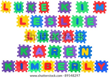 The names LUKE, KIM, LESLIE, LUKAS, KAREN and  KIMBERLY made of letter puzzle, isolated on white background.