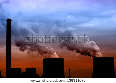 Coal power plant with chimney and cooling towers