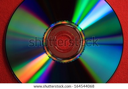 Digital Versatile Disk isolated on red background