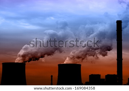 Coal power plant with chimney and cooling towers