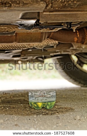 Photo of oil dripping under the car