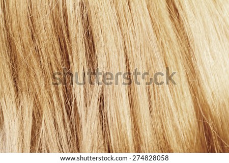 Blonde hair. Blond hair texture - closeup photo