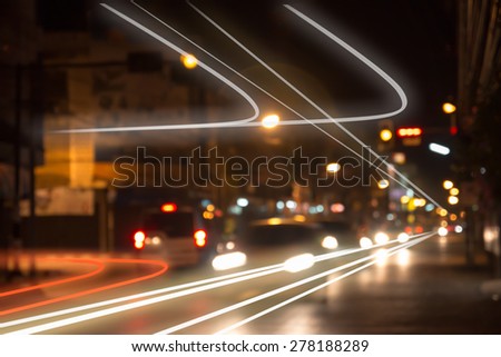 night traffic lights at intersection. The city lights. Motion blur. Abstract background