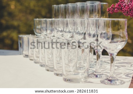 Empty wine glasses at wedding reception.