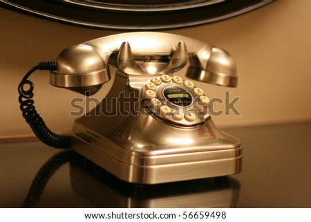A vintage telephone in black and white