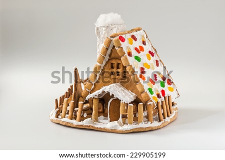 Christmas gingerbread house roof dotted with colorful candy