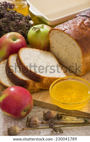 Homemade bread with poppy seeds with honey and apples