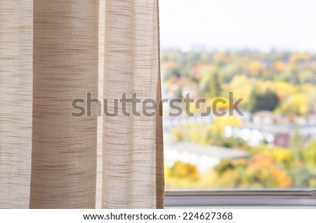 View from window, autumn, fall, linen curtain, blurry background, copy space for text