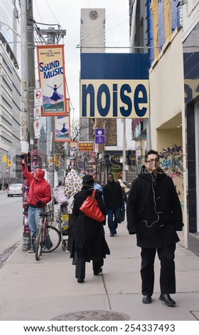 Toronto, Canada - December 02, 2008: Busy city life, street photography, concept of sounds, noise in center of downtown