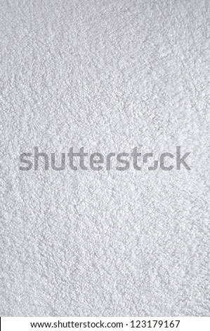 A fine texture of bright white bath towel.