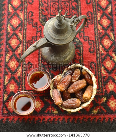 An Arabic Coffee Pot And Dates