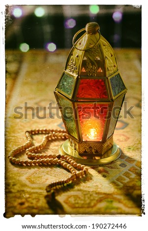 Ramadan lantern and rosary - old photo effect