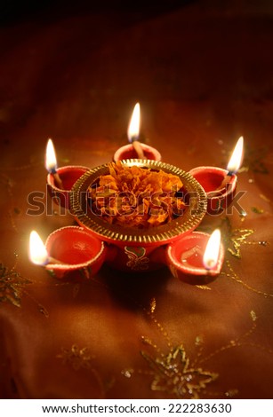 A traditional indian lamp - Diwali greeting card cover design.