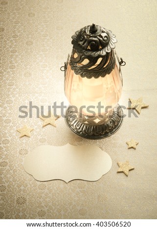 Arabic decorative lantern and empty tag. Eid or Ramadan festival background.