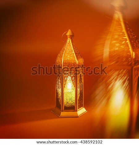 An abstract image of decorative Ramadan lantern.\'Ramadan Kareem\'. Greeting card cover.