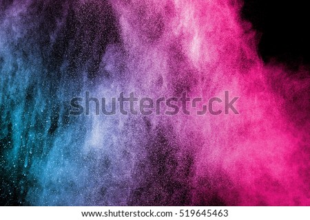 color powder explosion on black background. Mauve color cloud. color dust explode. Freeze motion paint Holi.