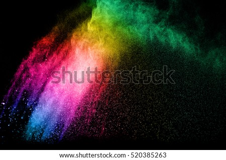 powder explosion on black background. Colored cloud. Colorful dust explode. Paint Holi.
