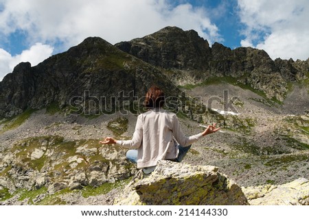 Girl in meditation on Alpi - Italy