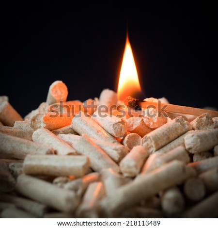 Pellets on a black background with flame