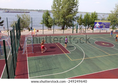 Samara, Russia - August 23, 2014: strangers on the Playground playing ball in Samara, Russia - August 23, 2014.