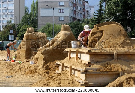 Sofia, Bulgaria - August 24, 2013: Artists are making sand sculptures participating in an annual Sand Sculpture Festival in Sofia.