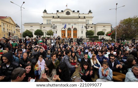 Sofia, Bulgaria - November 1, 2013: People are standiong in front of the Bulgarian parliament building at a protest against the government in county\'s capital.