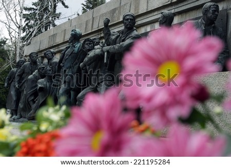 Flowers are left at the Soviet war memorial \