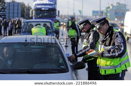 Sofia, Bulgaria - December 4, 2012: Traffic police conductes inspections of motor vehicles on ring road of Sofia, Bulgaria.