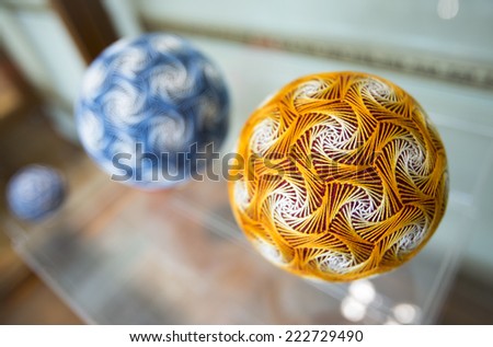 Temari balls are a folk art form that originated in China and was introduced to Japan around the 7th century. \