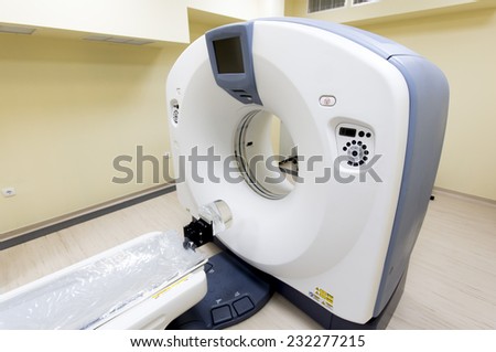 White medical CT scanner in a clinic.