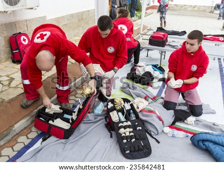 Sofia, Bulgaria - December 5, 2014: Members from Bulgarian Red Cross Youth (BRCY) voluntary youth organization are participating in a training simulation of a natural disaster situation.