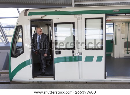 Sofia, Bulgaria - April 2, 2015: A subway train operator is waiting for the passengers to walk into the train for its first ride from the Sofia Airport extension.