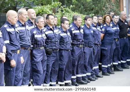 Sofia, Bulgaria - July 15, 2015: Firefighters are standing in a line during an awards ceremony in the fire department.