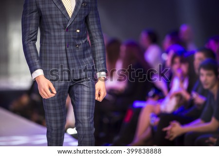 A male model walks the runway during the 2016 Sofia Fashion Week Show in Sofia, Bulgaria.