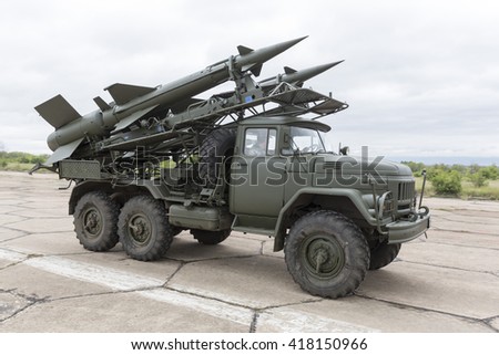 Mobile antiaircraft missile complex on a truck, ballistic launcher with missiles ready to attack on military powerful all-terrain transportation. Modern army industry equipment.
