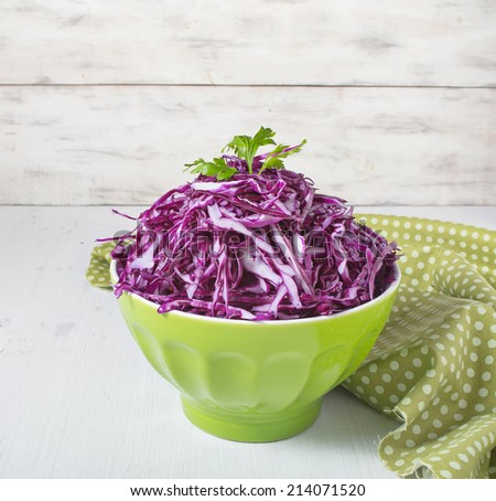 Coleslaw salad with red cabbage on light background