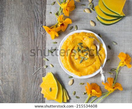 Sweet pumpkin porridge in flax napkin