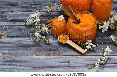 Sweet pumpkin jam in jar. Selective focus. Space for text