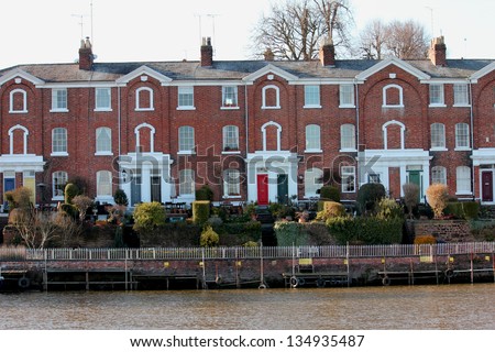 A terrace of fine houses fronting the River Dee in Chester, UK