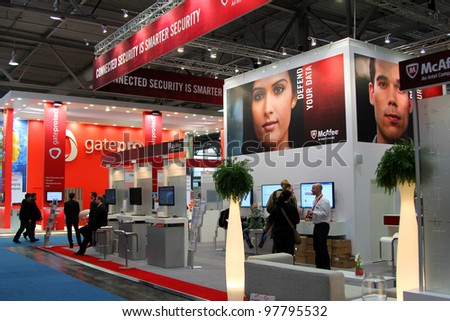 HANNOVER, GERMANY - MARCH 10: stand of McAfee on March 10, 2012 in CEBIT computer expo, Hannover, Germany. CeBIT is the world\'s largest computer expo