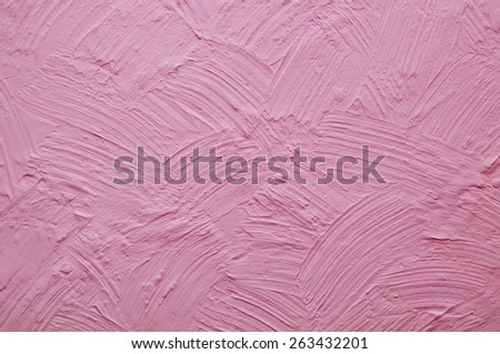 pink wall with plaster relief
