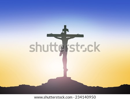 Silhouette Jesus on the cross over blurred sunset background.