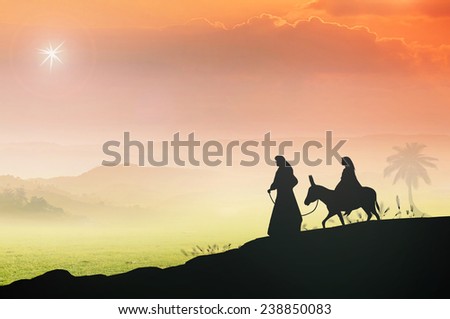 Mary and Joseph with a donkey on Christmas Eve Bethlehem city in the background Nativity story Mary and Joseph with a donkey on Christmas Eve Bethlehem city in the background Nativity story