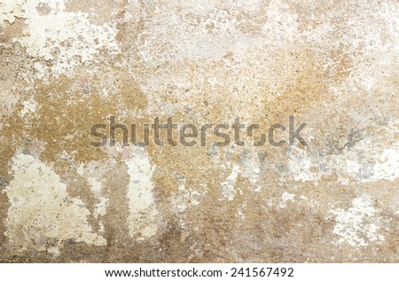 Grunge wall surface. Cracked concrete texture closeup background.