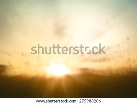 Abstract blurred yellow nature background. Light of hope from heaven concept.