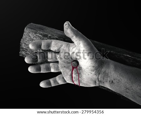 Black and white bleeding hand with nail on the cross.