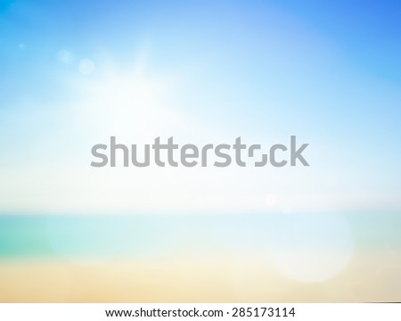 Blurred beautiful clear sea water and blue sky background. World Environment Day and World Oceans Day concept.
