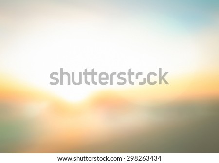 Vintage style. Abstract blurred textured background: yellow and orange patterns. Blurred nature background. Sandy beach backdrop with turquoise water and bright sun light. Summer holidays concept.